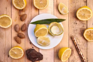 sliced lemon on white ceramic plate